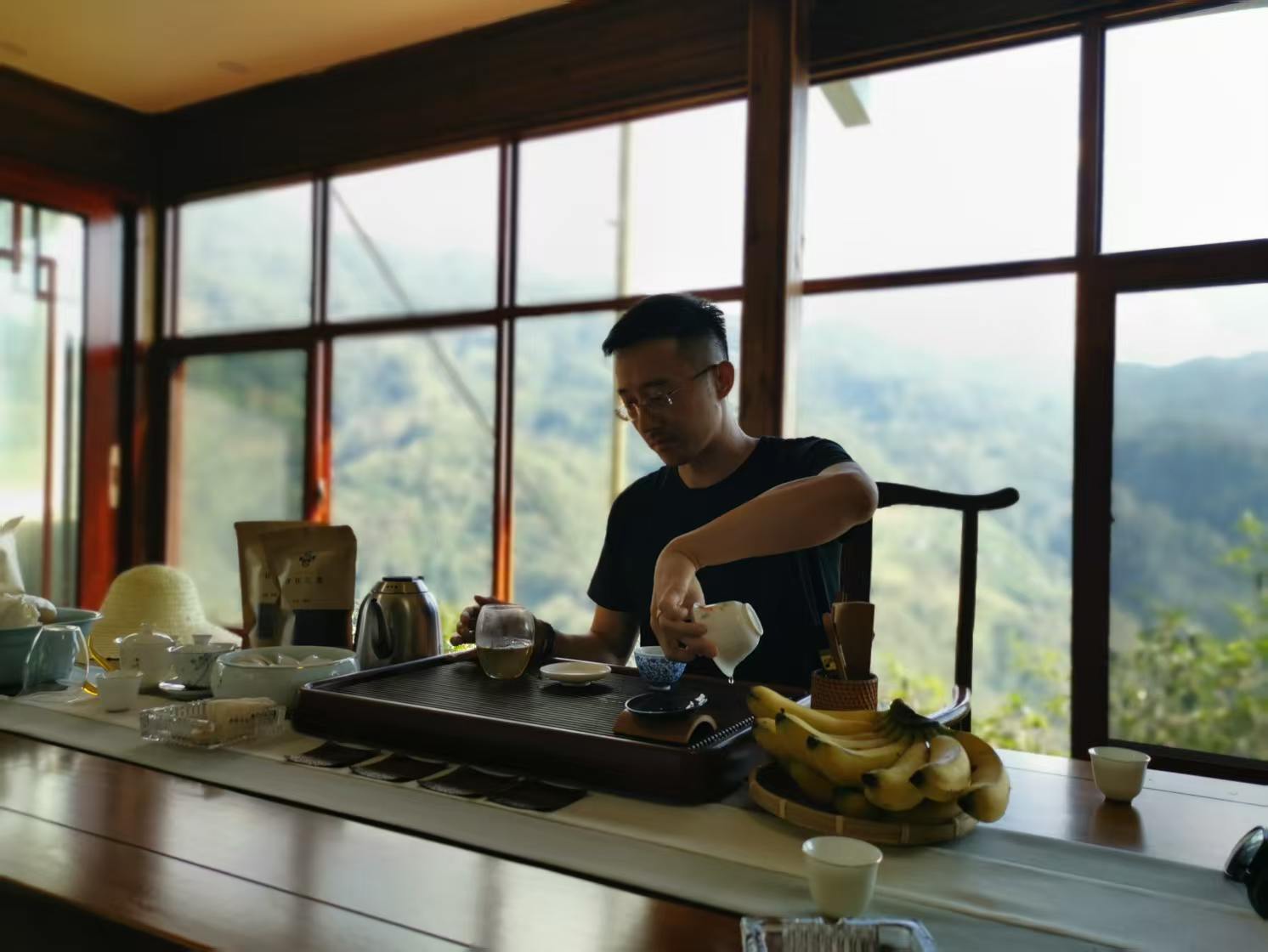 A finished cup of mountain tea on the tea table